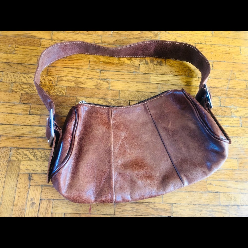 Brown purse. Made in Italy